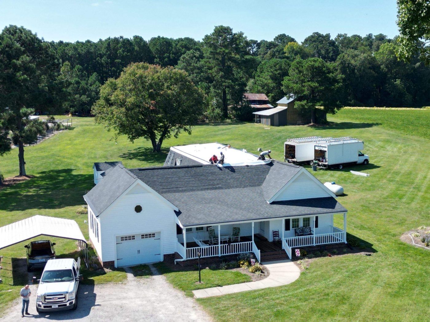 Residential flat roof by Five Oaks Roofing Plus