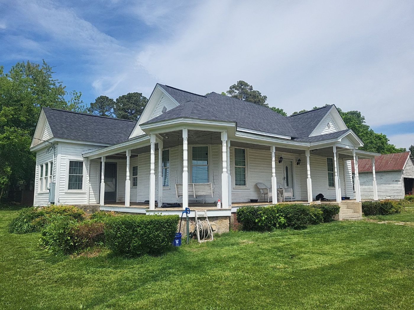 Shingle roof installed by Five Oaks Roofing Plus