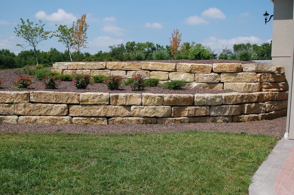 Boulder retaining wall installed by Premier Groundworks