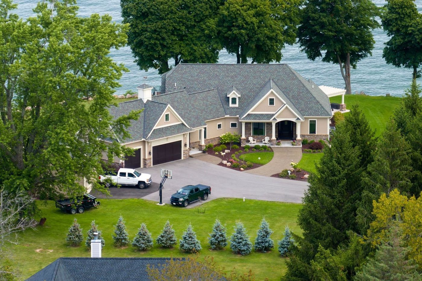 Lakefront home roofed by T&M Roofing